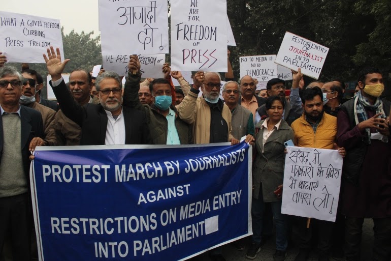 Anger over the introduction of a 'lottery system' to control the number of journalists reporting in Parliament Journalists protesting against restrictions for entry in parliament,